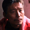 Haoyu Yang en el papel de Viejo Wang