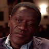 Benjamin Onyango en el papel de Reverendo Jude