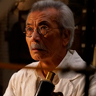 Min Tanaka en el papel de Kanji Murakami