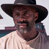 Idris Elba en el papel de Rufus Buck