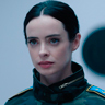 Krysten Ritter en el papel de Director Rockwell