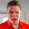 Thomas F. Wilson en el papel de Biff Tannen