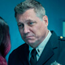 Holt McCallany en el papel de Lt. Tardelli