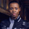 Tamberla Perry en el papel de Officer Tasha Goss