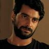 Firas Nassar en el papel de Ahmed Malik