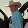 Mark Collie en el papel de Sheriff Walt Joeberg