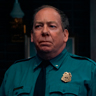 Bill Camp en el papel de Jefe Ellison